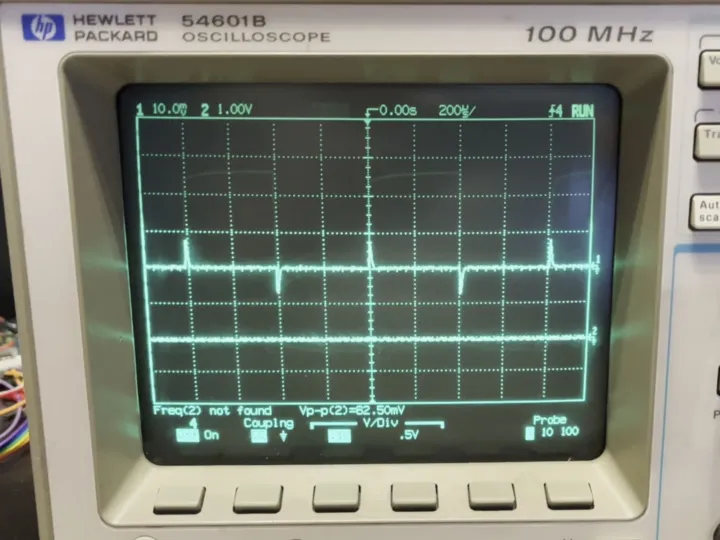 faulty oscilloscope showing a spiky ac-coupled signal